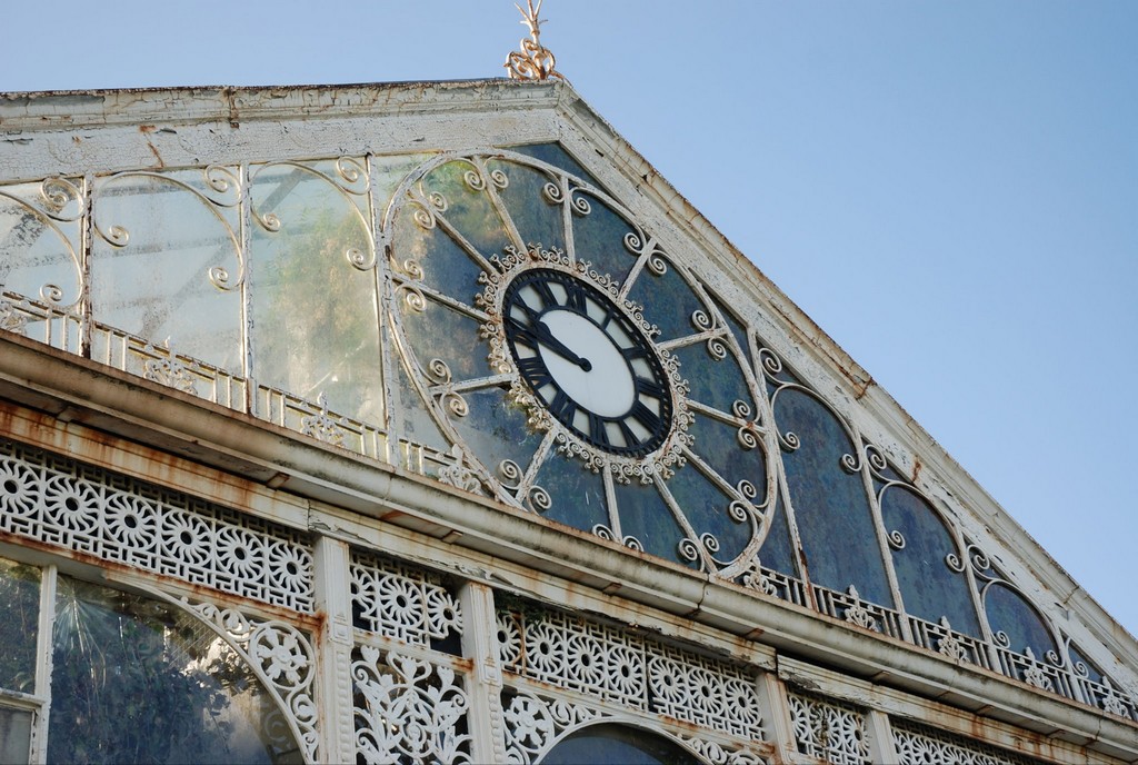 The clock and surrounding rusting intricate iron work in 2012